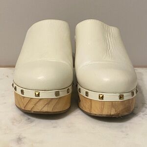 Bone Steve Madden platform clogs.